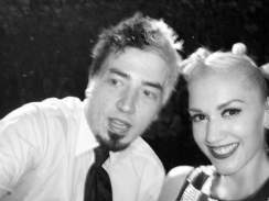 Chris Corman and Gwen Stefani take a selfie on stage